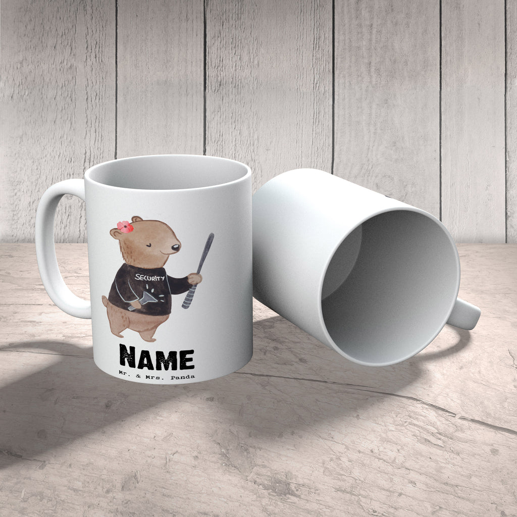 Personalisierte Tasse Sicherheitsdienstmitarbeiterin mit Herz Personalisierte Tasse, Namenstasse, Wunschname, Personalisiert, Tasse, Namen, Drucken, Tasse mit Namen, Beruf, Ausbildung, Jubiläum, Abschied, Rente, Kollege, Kollegin, Geschenk, Schenken, Arbeitskollege, Mitarbeiter, Firma, Danke, Dankeschön