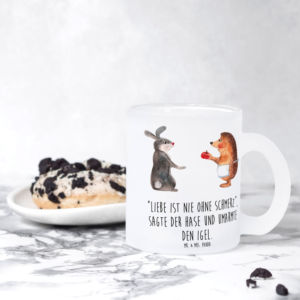 Teetasse Liebe ist nie ohne Schmerz Teetasse, Teeglas, Teebecher, Tasse mit Henkel, Tasse, Glas Teetasse, Teetasse aus Glas, Tiermotive, Gute Laune, lustige Sprüche, Tiere, Igel und Hase, Igel, Hase, Liebe Spruch, Liebeskummer Geschenk, Herzschmerz, Trösten, Trennungsschmerz, Spruch romantisch