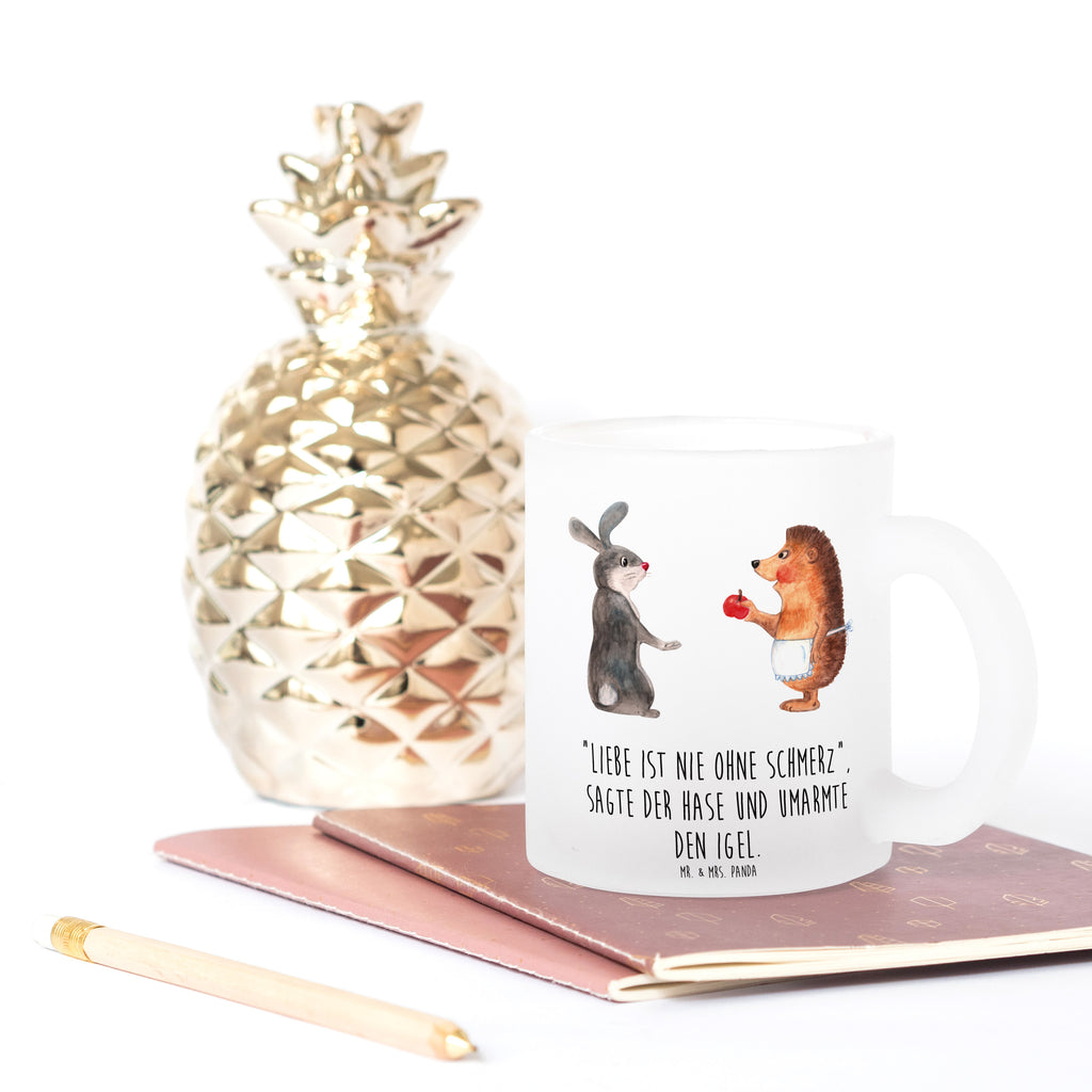 Teetasse Liebe ist nie ohne Schmerz Teetasse, Teeglas, Teebecher, Tasse mit Henkel, Tasse, Glas Teetasse, Teetasse aus Glas, Tiermotive, Gute Laune, lustige Sprüche, Tiere, Igel und Hase, Igel, Hase, Liebe Spruch, Liebeskummer Geschenk, Herzschmerz, Trösten, Trennungsschmerz, Spruch romantisch