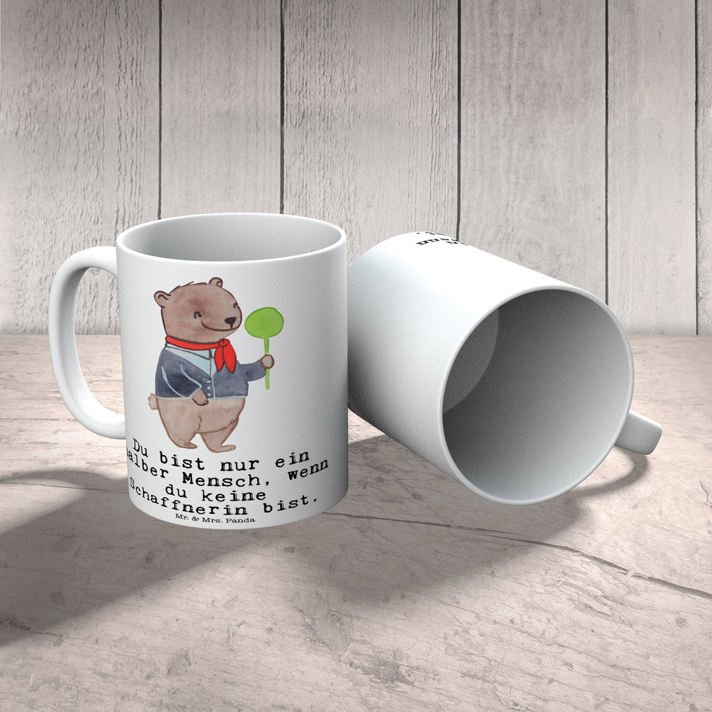 Tasse Schaffnerin mit Herz Tasse, Kaffeetasse, Teetasse, Becher, Kaffeebecher, Teebecher, Keramiktasse, Porzellantasse, Büro Tasse, Geschenk Tasse, Tasse Sprüche, Tasse Motive, Kaffeetassen, Tasse bedrucken, Designer Tasse, Cappuccino Tassen, Schöne Teetassen, Beruf, Ausbildung, Jubiläum, Abschied, Rente, Kollege, Kollegin, Geschenk, Schenken, Arbeitskollege, Mitarbeiter, Firma, Danke, Dankeschön