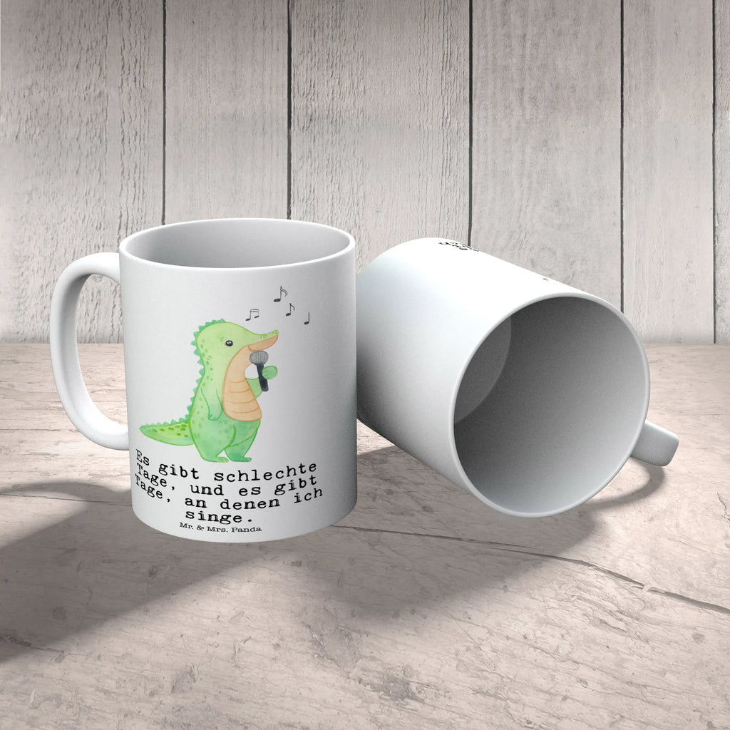 Tasse Krokodil Singen Tasse, Kaffeetasse, Teetasse, Becher, Kaffeebecher, Teebecher, Keramiktasse, Porzellantasse, Büro Tasse, Geschenk Tasse, Tasse Sprüche, Tasse Motive, Kaffeetassen, Tasse bedrucken, Designer Tasse, Cappuccino Tassen, Schöne Teetassen, Geschenk, Sport, Sportart, Hobby, Schenken, Danke, Dankeschön, Auszeichnung, Gewinn, Sportler, Singen, Band, Live Auftritt, Gesang, Hobbysänger