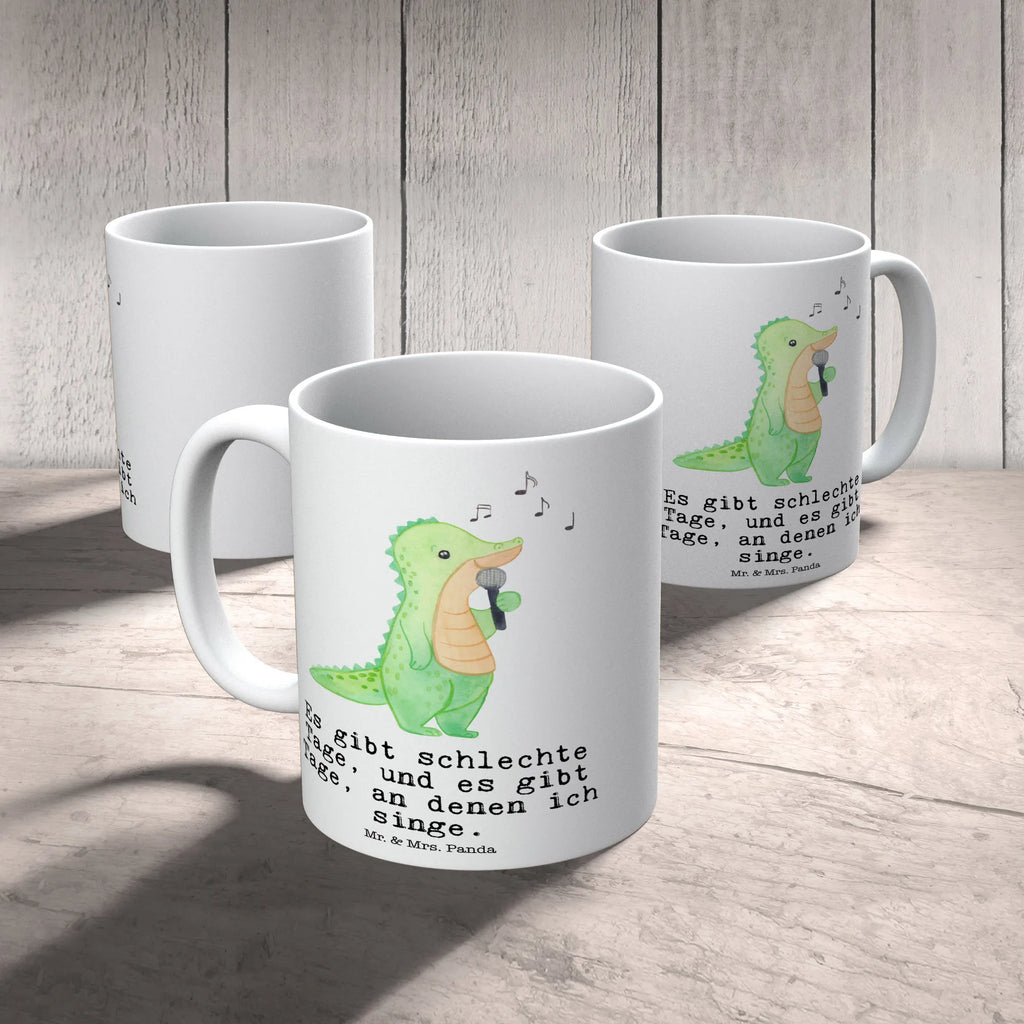 Tasse Krokodil Singen Tasse, Kaffeetasse, Teetasse, Becher, Kaffeebecher, Teebecher, Keramiktasse, Porzellantasse, Büro Tasse, Geschenk Tasse, Tasse Sprüche, Tasse Motive, Kaffeetassen, Tasse bedrucken, Designer Tasse, Cappuccino Tassen, Schöne Teetassen, Geschenk, Sport, Sportart, Hobby, Schenken, Danke, Dankeschön, Auszeichnung, Gewinn, Sportler, Singen, Band, Live Auftritt, Gesang, Hobbysänger