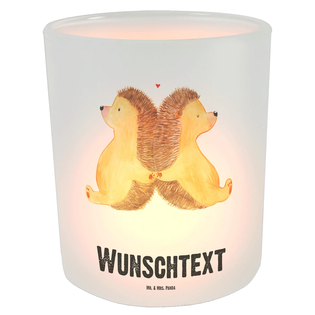 Personalisiertes Windlicht Igel händchenhaltend Personalisiertes Windlicht, Personalisiertes Windlicht Glas, Personalisiertes Teelichtglas, Personalisierter Teelichthalter, Personalisiertes Kerzenglas, Personalisierte Kerze, Personalisiertes Teelicht, Windlicht mit Namen, Windlicht Glas mit Namen, Teelichtglas mit Namen, Teelichthalter mit Namen, Teelichter mit Namen, Kerzenglas mit Namen, Kerze mit Namen, Teelicht mit Namen, Namenspersonalisierung, Name, selbst gestalten, Wunschtext, Bedrucken, Liebe, Partner, Freund, Freundin, Ehemann, Ehefrau, Heiraten, Verlobung, Heiratsantrag, Liebesgeschenk, Jahrestag, Hocheitstag, Igel, Igelliebe, Hand in Hand, Liebesbeweis, große Liebe, Liebesbotschaft, Hochzeit, Lieblingsmensch, Gemeinsamkeit, Love, Geschenk für zwei