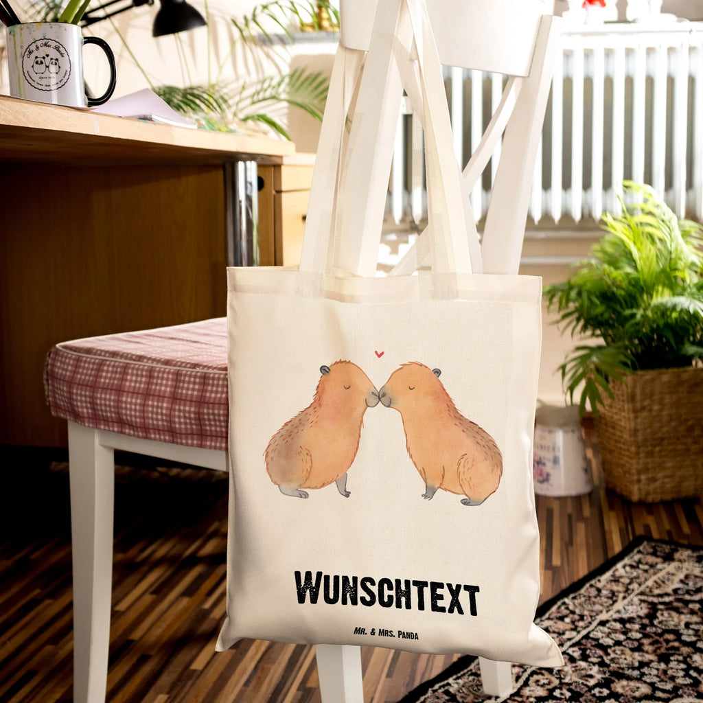 Personalisierte Tragetasche Capybara Liebe Personalisierte Beuteltasche, Personalisierter Beutel, Personalisierte Einkaufstasche, Personalisierter Jutebeutel, Personalisierter Stoffbeutel, Tragetasche mit Namen, Einkaufstasche mit Namen, Stoffbeutel mit Namen, Personalisierte Tasche, Personalisierte Jutetasche, Personalisierte Kindergartentasche, Tiermotive, Gute Laune, lustige Sprüche, Tiere, Capybara, Liebe, verliebt, Paar, Jahrestag, Kuschel Capybaras, Tierliebe, Romantisches Geschenk, Handgezeichnet, Verschmolzen, Geschenkidee, Beziehung, Partnertiere, Ich bin deins, Du bist meins, Liebesspruch, Herzlich, Valentinstag, Ehejubiläum, Liebesbeweis