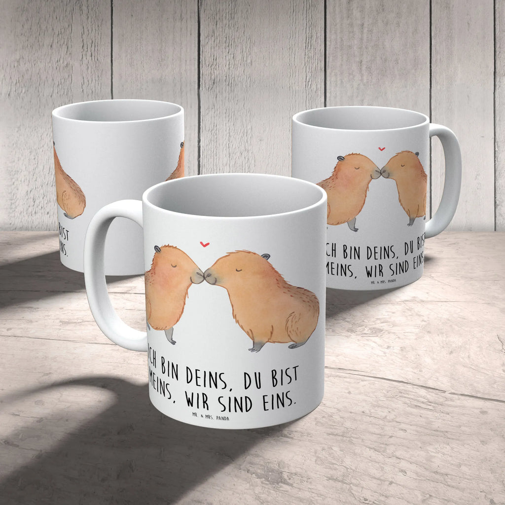 Tasse Capybara Liebe Tasse, Kaffeetasse, Teetasse, Becher, Kaffeebecher, Teebecher, Keramiktasse, Porzellantasse, Büro Tasse, Geschenk Tasse, Tasse Sprüche, Tasse Motive, Kaffeetassen, Tasse bedrucken, Designer Tasse, Cappuccino Tassen, Schöne Teetassen, Tiermotive, Gute Laune, lustige Sprüche, Tiere, Capybara, Liebe, verliebt, Paar, Jahrestag, Kuschel Capybaras, Tierliebe, Romantisches Geschenk, Handgezeichnet, Verschmolzen, Geschenkidee, Beziehung, Partnertiere, Ich bin deins, Du bist meins, Liebesspruch, Herzlich, Valentinstag, Ehejubiläum, Liebesbeweis