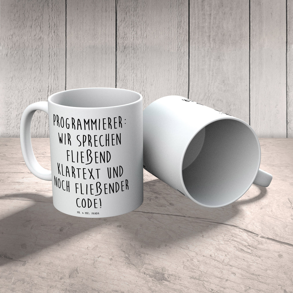 Tasse Programmierer: Wir sprechen fließend Klartext und noch fließender Code! Tasse, Kaffeetasse, Teetasse, Becher, Kaffeebecher, Teebecher, Keramiktasse, Porzellantasse, Büro Tasse, Geschenk Tasse, Tasse Sprüche, Tasse Motive, Kaffeetassen, Tasse bedrucken, Designer Tasse, Cappuccino Tassen, Schöne Teetassen, Beruf, Ausbildung, Jubiläum, Abschied, Rente, Kollege, Kollegin, Geschenk, Schenken, Arbeitskollege, Mitarbeiter, Firma, Danke, Dankeschön