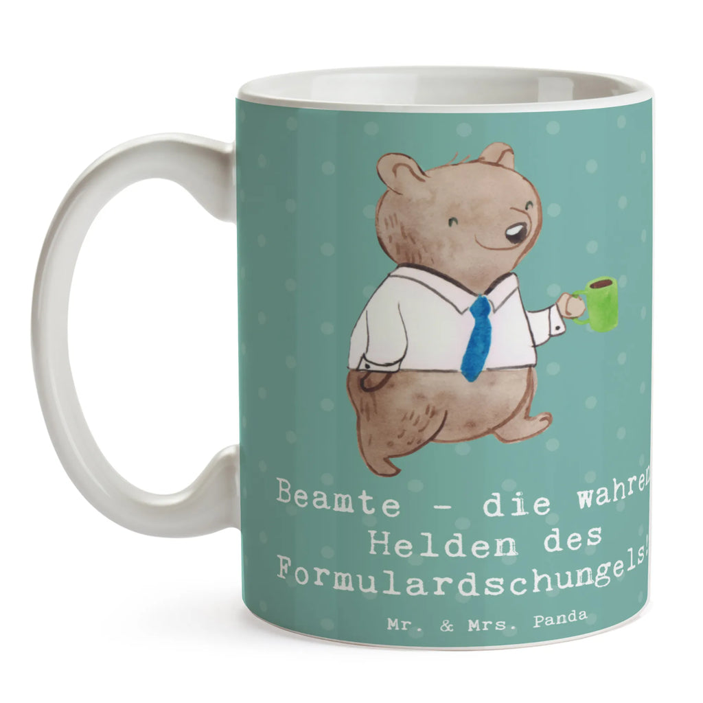 Tasse Beamtin Heldin Tasse, Kaffeetasse, Teetasse, Becher, Kaffeebecher, Teebecher, Keramiktasse, Porzellantasse, Büro Tasse, Geschenk Tasse, Tasse Sprüche, Tasse Motive, Kaffeetassen, Tasse bedrucken, Designer Tasse, Cappuccino Tassen, Schöne Teetassen, Beruf, Ausbildung, Jubiläum, Abschied, Rente, Kollege, Kollegin, Geschenk, Schenken, Arbeitskollege, Mitarbeiter, Firma, Danke, Dankeschön