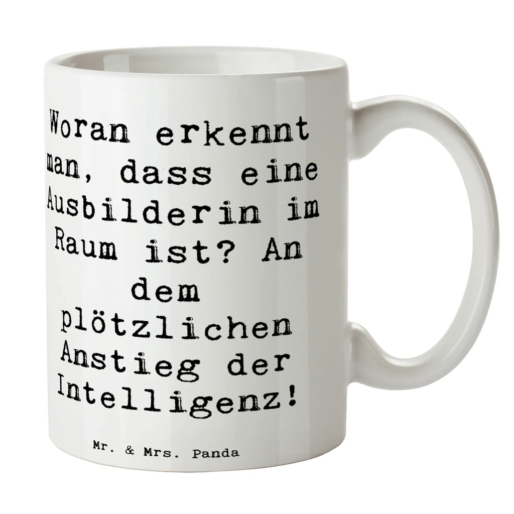 Tasse Spruch Woran erkennt man, dass eine Ausbilderin im Raum ist? An dem plötzlichen Anstieg der Intelligenz! Tasse, Kaffeetasse, Teetasse, Becher, Kaffeebecher, Teebecher, Keramiktasse, Porzellantasse, Büro Tasse, Geschenk Tasse, Tasse Sprüche, Tasse Motive, Kaffeetassen, Tasse bedrucken, Designer Tasse, Cappuccino Tassen, Schöne Teetassen, Beruf, Ausbildung, Jubiläum, Abschied, Rente, Kollege, Kollegin, Geschenk, Schenken, Arbeitskollege, Mitarbeiter, Firma, Danke, Dankeschön