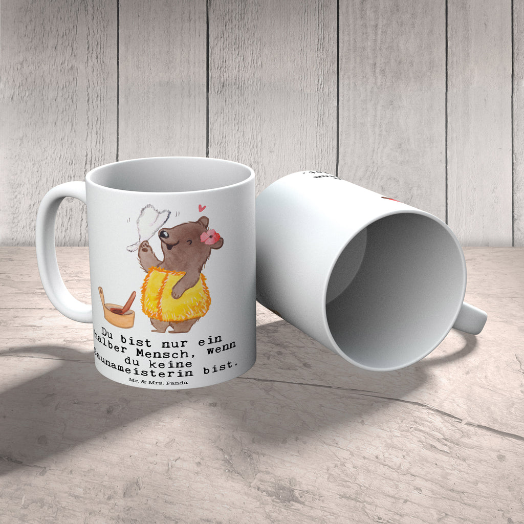 Tasse Saunameisterin mit Herz Tasse, Kaffeetasse, Teetasse, Becher, Kaffeebecher, Teebecher, Keramiktasse, Porzellantasse, Büro Tasse, Geschenk Tasse, Tasse Sprüche, Tasse Motive, Kaffeetassen, Tasse bedrucken, Designer Tasse, Cappuccino Tassen, Schöne Teetassen, Beruf, Ausbildung, Jubiläum, Abschied, Rente, Kollege, Kollegin, Geschenk, Schenken, Arbeitskollege, Mitarbeiter, Firma, Danke, Dankeschön