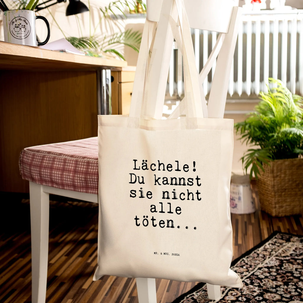 Tragetasche Lächele! Du kannst sie... Beuteltasche, Beutel, Einkaufstasche, Jutebeutel, Stoffbeutel, Tasche, Shopper, Umhängetasche, Strandtasche, Schultertasche, Stofftasche, Tragetasche, Badetasche, Jutetasche, Einkaufstüte, Laptoptasche, Spruch, Sprüche, lustige Sprüche, Weisheiten, Zitate, Spruch Geschenke, Spruch Sprüche Weisheiten Zitate Lustig Weisheit Worte