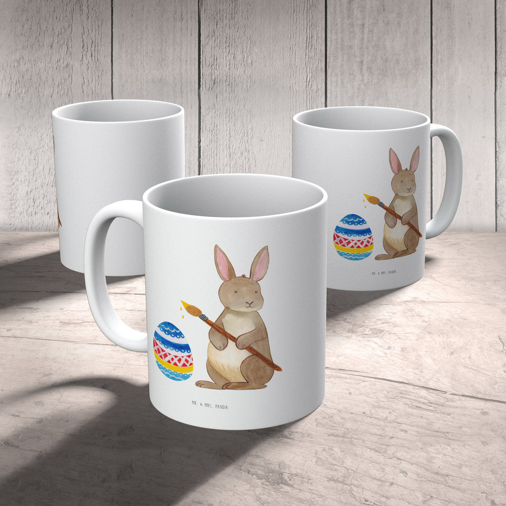 Tasse Hase Eiermalen Tasse, Kaffeetasse, Teetasse, Becher, Kaffeebecher, Teebecher, Keramiktasse, Porzellantasse, Büro Tasse, Geschenk Tasse, Tasse Sprüche, Tasse Motive, Kaffeetassen, Tasse bedrucken, Designer Tasse, Cappuccino Tassen, Schöne Teetassen, Ostern, Osterhase, Ostergeschenke, Osternest, Osterdeko, Geschenke zu Ostern, Ostern Geschenk, Ostergeschenke Kinder, Ostern Kinder, Frohe Ostern, Ostergrüße, Osterblume, Osterei, bemalte Ostereier, Hase, Kaninchen, Eiermalen