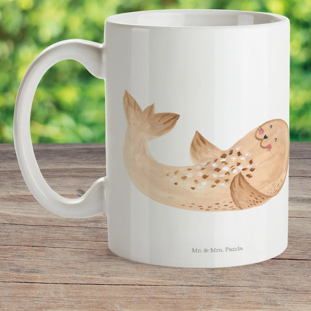 Kindertasse Robbe Liegen Kindertasse, Kinder Tasse, Kunststoff Tasse, Kindergarten Tasse, Trinkbecher, Camping Becher, Kaffeetasse, Kunststoffbecher, Kindergartenbecher, Outdoorgeschirr, Kunststoffgeschirr, Reisebecher, Reisetasse, Kinderbecher, Bruchfeste Tasse, Bruchsichere Tasse, Plastik Tasse, Plastiktasse, Tiermotive, Gute Laune, lustige Sprüche, Tiere, Robbe, Robben, Seehund, Strand, Meerestier, Ostsee, Nordsee, Lachen, Freude