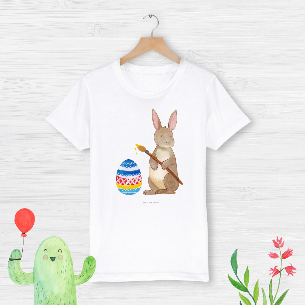 Organic Kinder T-Shirt Hase Eiermalen Kinder T-Shirt, Kinder T-Shirt Mädchen, Kinder T-Shirt Jungen, Ostern, Osterhase, Ostergeschenke, Osternest, Osterdeko, Geschenke zu Ostern, Ostern Geschenk, Ostergeschenke Kinder, Ostern Kinder, Frohe Ostern, Ostergrüße, Osterblume, Osterei, bemalte Ostereier, Hase, Kaninchen, Eiermalen