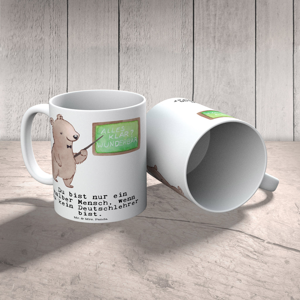 Tasse Deutschlehrer mit Herz Tasse, Kaffeetasse, Teetasse, Becher, Kaffeebecher, Teebecher, Keramiktasse, Porzellantasse, Büro Tasse, Geschenk Tasse, Tasse Sprüche, Tasse Motive, Kaffeetassen, Tasse bedrucken, Designer Tasse, Cappuccino Tassen, Schöne Teetassen, Beruf, Ausbildung, Jubiläum, Abschied, Rente, Kollege, Kollegin, Geschenk, Schenken, Arbeitskollege, Mitarbeiter, Firma, Danke, Dankeschön, Deutschlehrer, Deutschunterricht, Schule, Grundschule