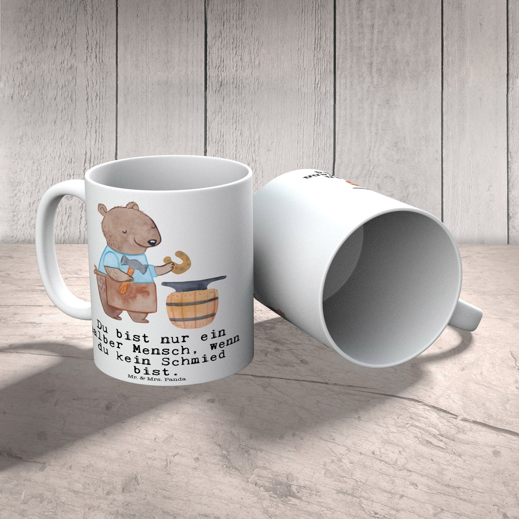 Tasse Schmied mit Herz Tasse, Kaffeetasse, Teetasse, Becher, Kaffeebecher, Teebecher, Keramiktasse, Porzellantasse, Büro Tasse, Geschenk Tasse, Tasse Sprüche, Tasse Motive, Kaffeetassen, Tasse bedrucken, Designer Tasse, Cappuccino Tassen, Schöne Teetassen, Beruf, Ausbildung, Jubiläum, Abschied, Rente, Kollege, Kollegin, Geschenk, Schenken, Arbeitskollege, Mitarbeiter, Firma, Danke, Dankeschön